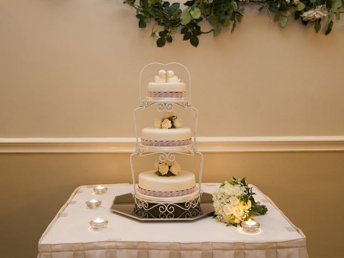 three tier white wedding cake bird cake toppers